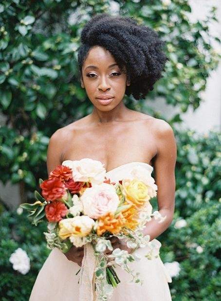 This natural side 'fro will give the black bride a funky look.