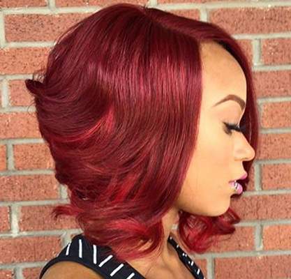 By using Inecto ruby red the African women will add a touch of class to this bob hairstyle.